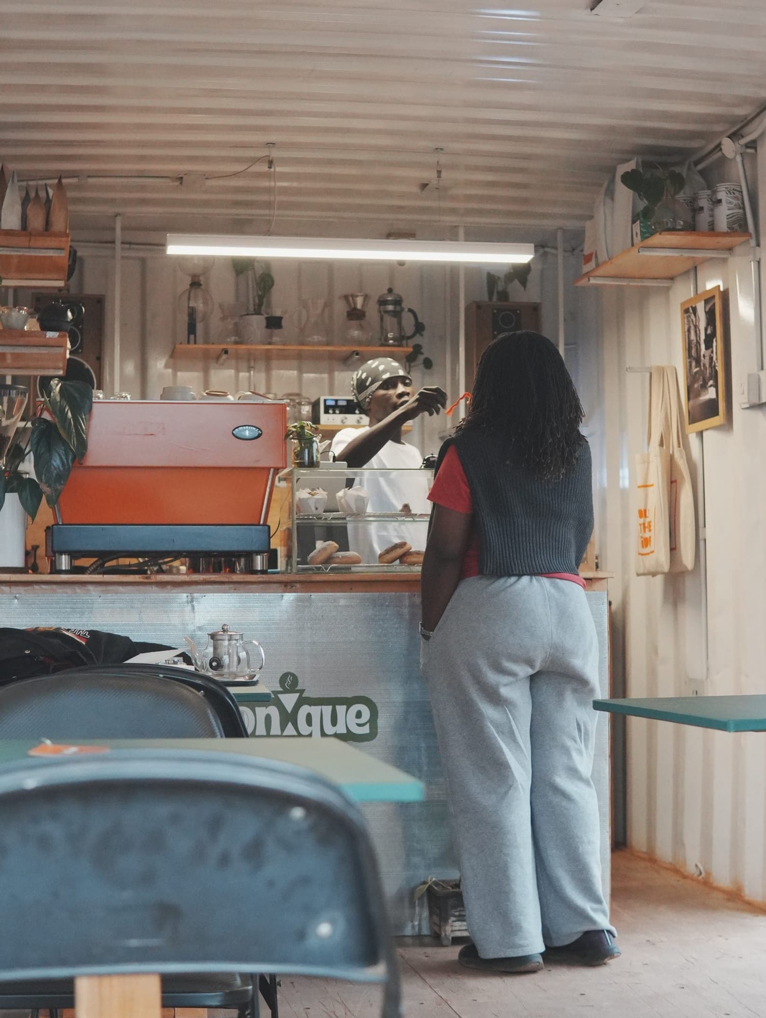 A guest ordering at the Sonique bar